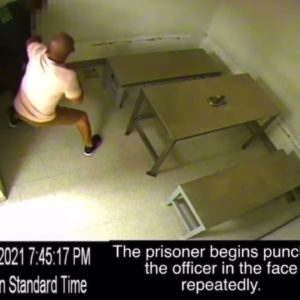 Prisoner Knocks Police Officer Out - Civilian Intervenes